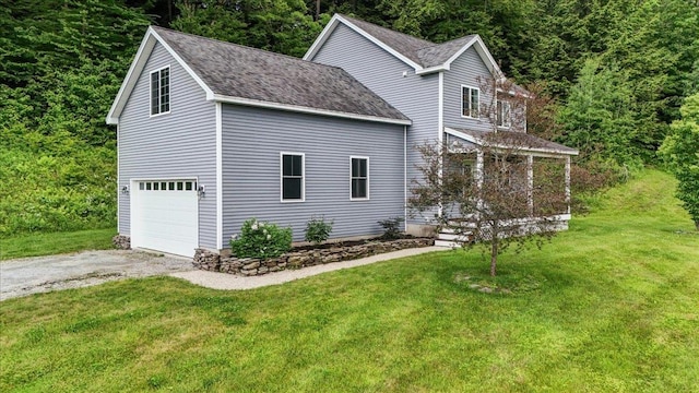 54 Gallagher Acres Ext, Moretown, VT 05676 - view of side of property with asphalt driveway, a shingled roof, and a yard