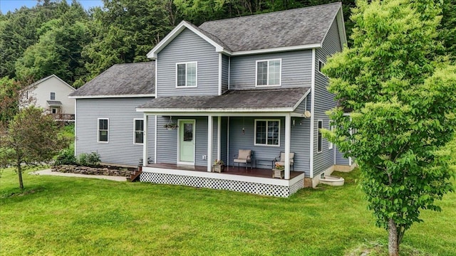 54 Gallagher Acres Ext, Moretown, VT 05676 - view of front of property with a porch, roof with shingles, and a front lawn