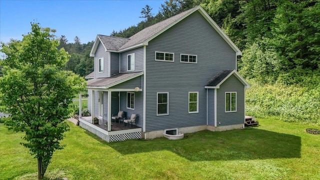54 Gallagher Acres Ext, Moretown, VT 05676 - back of property with a yard, a porch, and a shingled roof