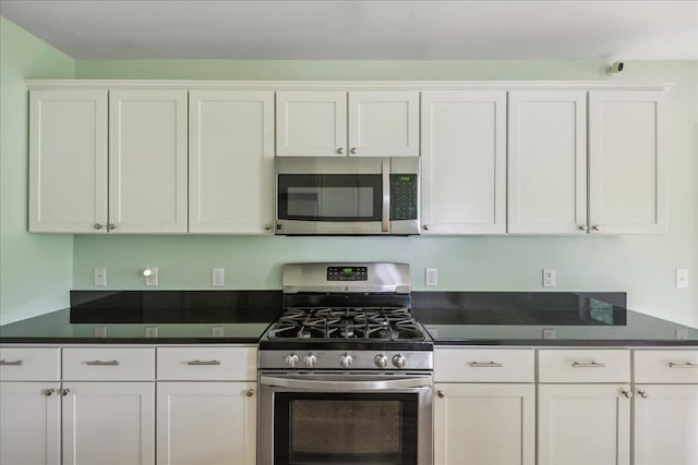 54 Gallagher Acres Ext, Moretown, VT 05676 - kitchen with stainless steel appliances, white cabinets, and dark countertops