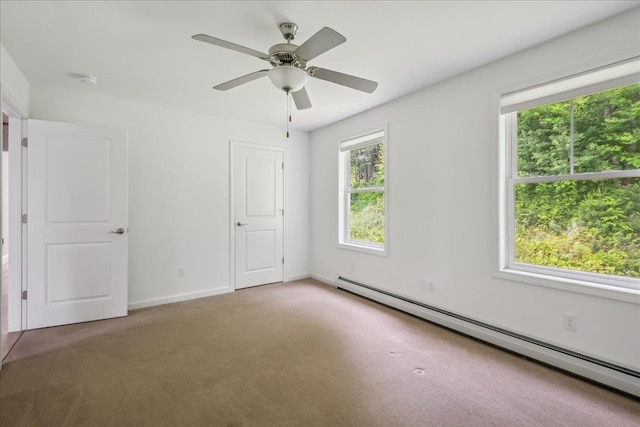 54 Gallagher Acres Ext, Moretown, VT 05676 - unfurnished bedroom with a baseboard radiator, carpet floors, and a ceiling fan