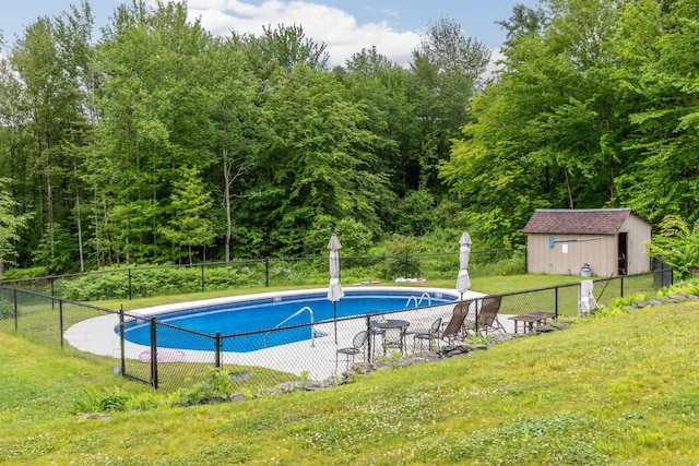 2366 Mountain Rd Unit 1, Stowe, VT 05672 - view of swimming pool with an outdoor structure and a forest view