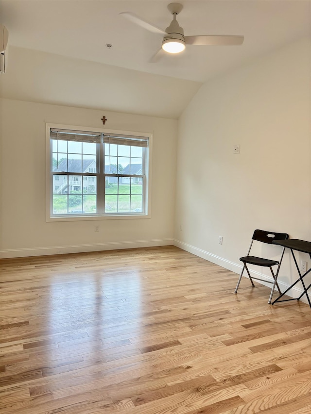 10 Diamond Oaks Blvd Unit 6, Kingston, NH 03848 - unfurnished room featuring lofted ceiling, light wood finished floors, a ceiling fan, and an AC wall unit