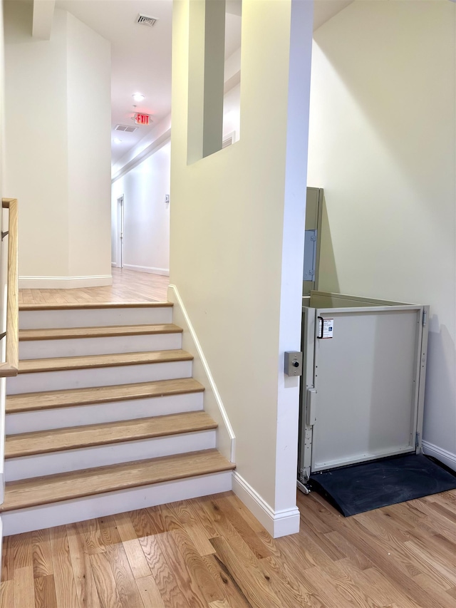 10 Diamond Oaks Blvd Unit 6, Kingston, NH 03848 - stairs with wood finished floors and baseboards