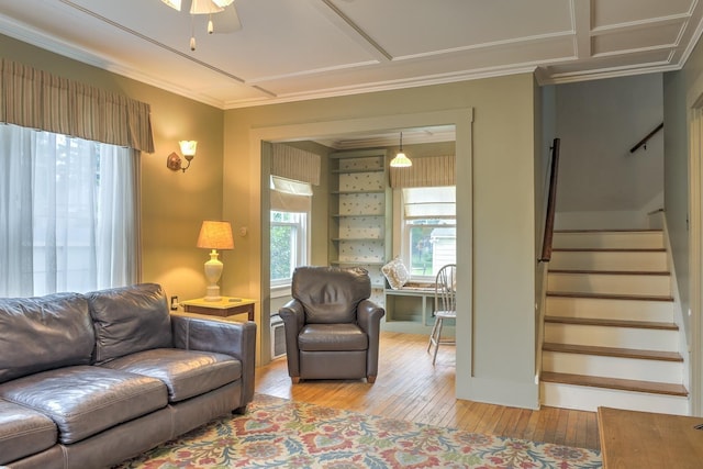382 Park Ave, Keene, NH 03431 - living area with light wood-style flooring, stairway, a ceiling fan, and ornamental molding