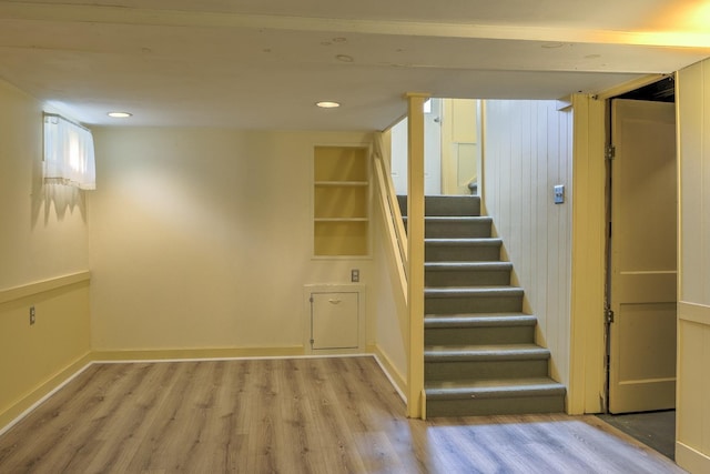 382 Park Ave, Keene, NH 03431 - finished basement with wood finished floors, stairway, and recessed lighting