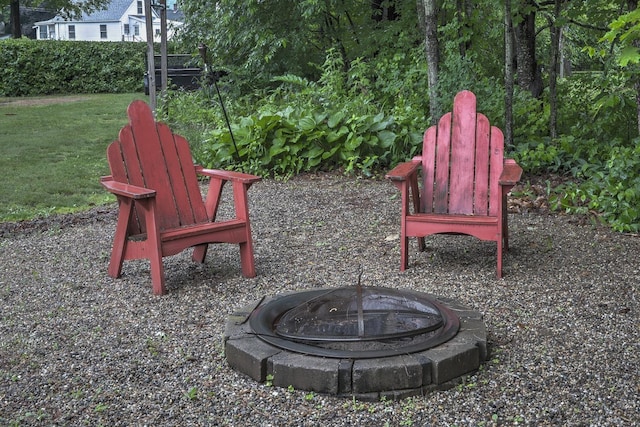 382 Park Ave, Keene, NH 03431 - view of green lawn with an outdoor fire pit