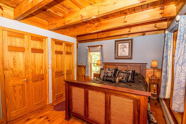 20 Pine Lane Rd, Ossipee, NH 03890 - bedroom with light wood finished floors, a wood ceiling with exposed beams, and a baseboard radiator