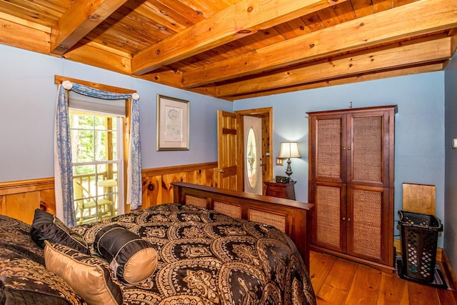 20 Pine Lane Rd, Ossipee, NH 03890 - bedroom with a wooden ceiling with exposed beams, hardwood / wood-style flooring, a wainscoted wall, and wooden walls