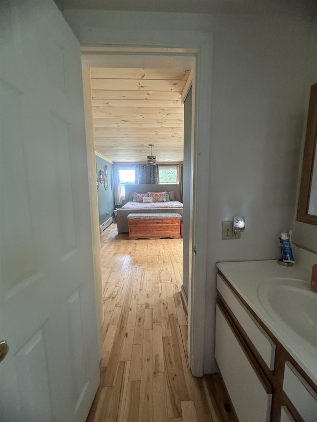 2940 Rte 30, Castleton, VT 05732 - bathroom with wood-type flooring and vanity