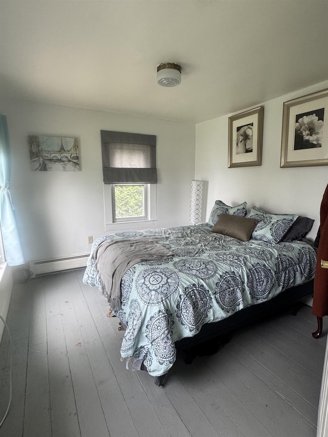 2940 Rte 30, Castleton, VT 05732 - bedroom featuring baseboard heating and hardwood / wood-style flooring