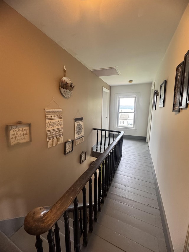 2940 Rte 30, Castleton, VT 05732 - hallway with an upstairs landing and wood-type flooring
