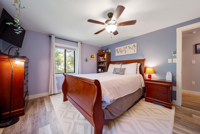 9 Swiftwater Dr Unit 5, Allenstown, NH 03275 - bedroom featuring light wood-style floors and a ceiling fan