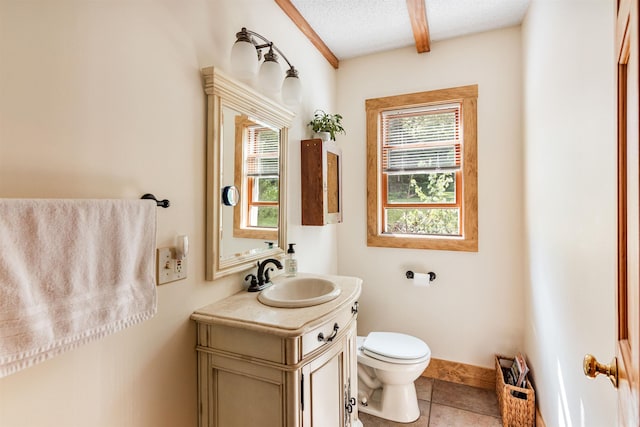 532 Randolph Rd, Stowe, VT 05672 - bathroom with vanity, plenty of natural light, tile patterned flooring, and a textured ceiling