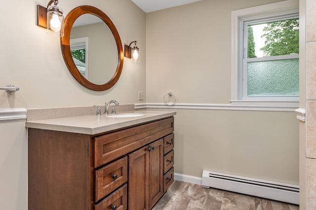 2 Littlehale Rd, Durham, NH 03824 - bathroom featuring a baseboard heating unit and vanity
