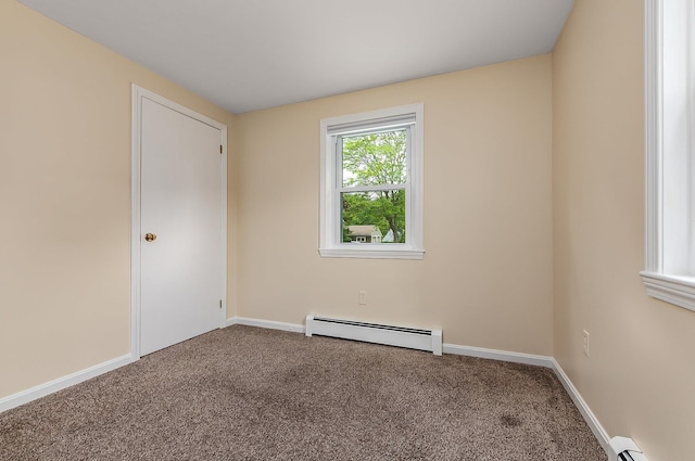2 Littlehale Rd, Durham, NH 03824 - carpeted empty room featuring baseboard heating and a baseboard radiator