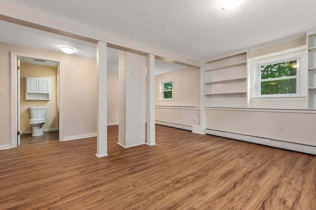 2 Littlehale Rd, Durham, NH 03824 - unfurnished bedroom featuring baseboard heating, wood finished floors, and ensuite bathroom