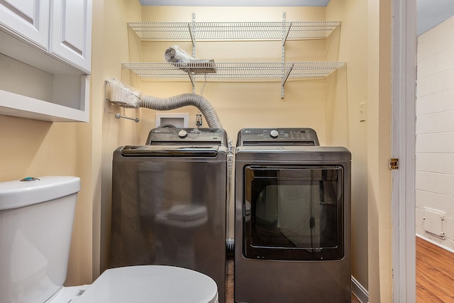 2 Littlehale Rd, Durham, NH 03824 - laundry room with separate washer and dryer and wood finished floors