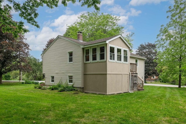 2 Littlehale Rd, Durham, NH 03824 - view of home's exterior with a chimney, a lawn, stairway, and a shingled roof