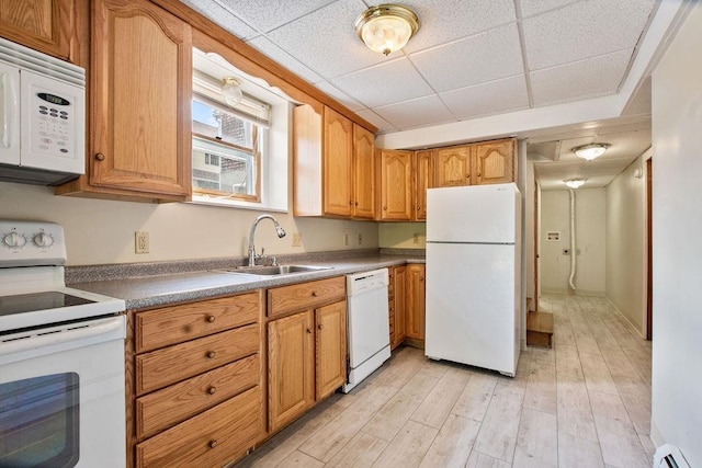 23 Riverlake St, Alton, NH 03810 - kitchen with white appliances, baseboard heating, light wood-style floors, a drop ceiling, and brown cabinets