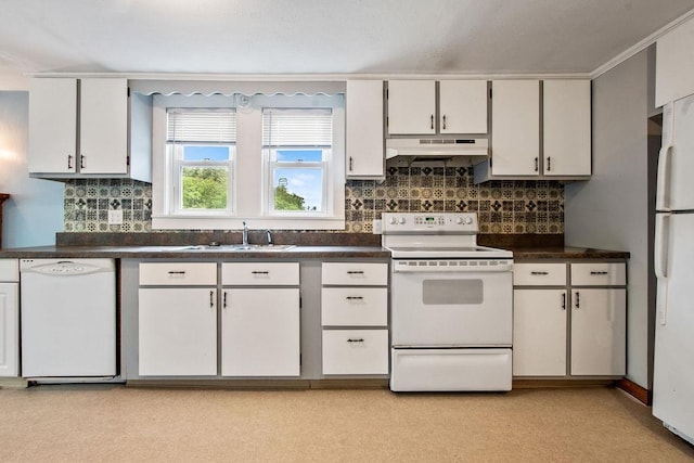 23 Riverlake St, Alton, NH 03810 - kitchen featuring white appliances, under cabinet range hood, dark countertops, tasteful backsplash, and crown molding