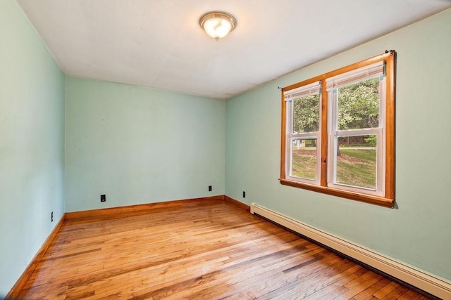 23 Riverlake St, Alton, NH 03810 - spare room featuring baseboard heating and light wood finished floors