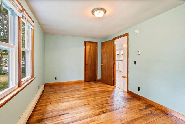 23 Riverlake St, Alton, NH 03810 - spare room featuring light wood-style floors and baseboards