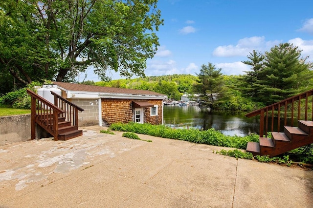 23 Riverlake St, Alton, NH 03810 - exterior space with stairway and a water view