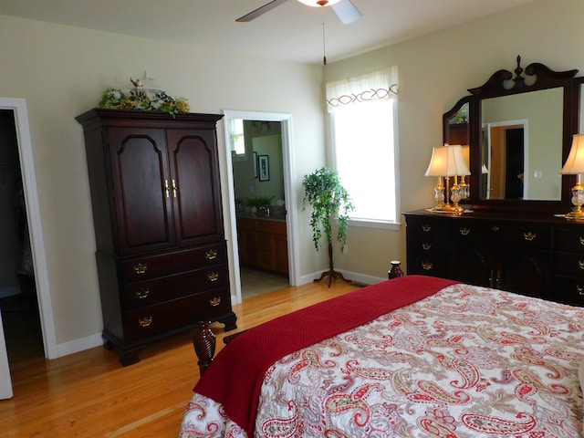 150 Pleasant Pond Way Unit 15, Manchester, NH 03102 - bedroom with light wood finished floors, connected bathroom, and a ceiling fan