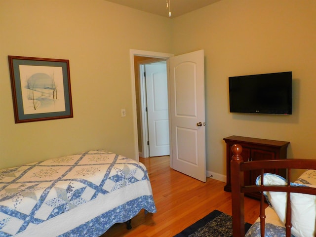 150 Pleasant Pond Way Unit 15, Manchester, NH 03102 - bedroom featuring wood finished floors and baseboards