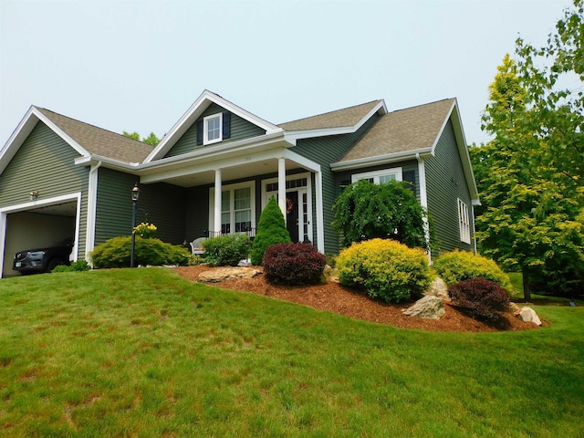 150 Pleasant Pond Way Unit 15, Manchester, NH 03102 - view of front of house with a garage, a front lawn, covered porch, and roof with shingles