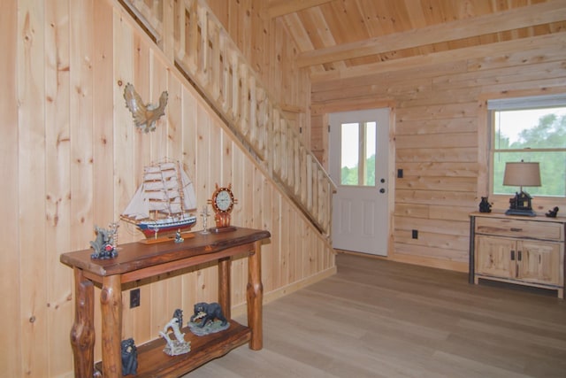 535 Mead Hill Rd, Holland, VT 05830 - foyer with wood ceiling, wooden walls, wood finished floors, and stairway
