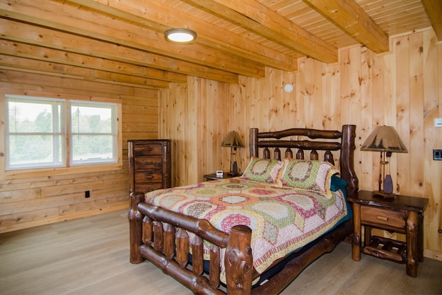 535 Mead Hill Rd, Holland, VT 05830 - bedroom with wood finished floors, wood walls, and a wooden ceiling with exposed beams
