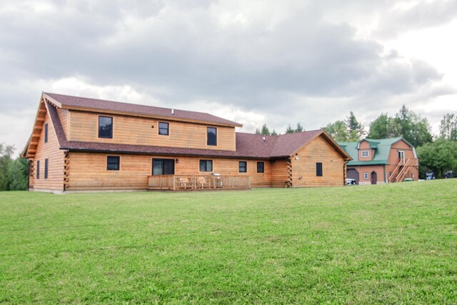 535 Mead Hill Rd, Holland, VT 05830 - rear view of property featuring a lawn and log siding