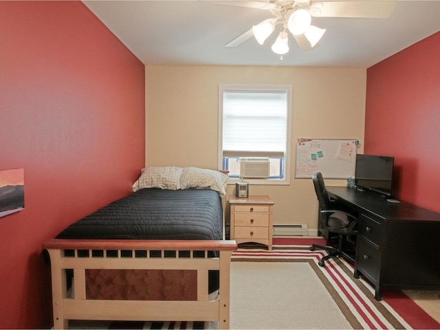 343 Cobblestone Cir S, Burlington, VT 05403 - carpeted bedroom featuring baseboard heating, a desk, ceiling fan, and cooling unit