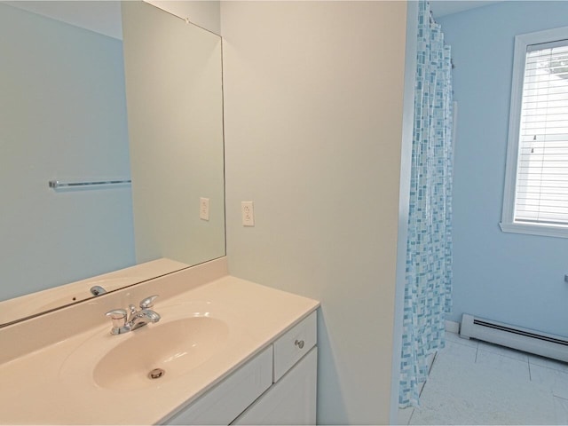 343 Cobblestone Cir S, Burlington, VT 05403 - bathroom featuring a baseboard heating unit, vanity, curtained shower, and tile patterned floors