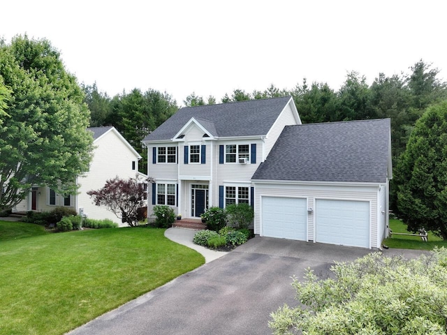 343 Cobblestone Cir S, Burlington, VT 05403 - colonial inspired home with a garage, driveway, a front yard, and a shingled roof