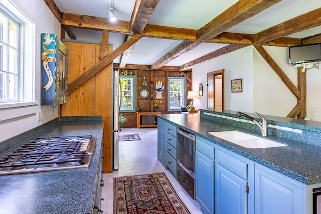 428 N Rd, Salisbury, NH 03235 - kitchen with stainless steel appliances, beam ceiling, radiator heating unit, and blue cabinets