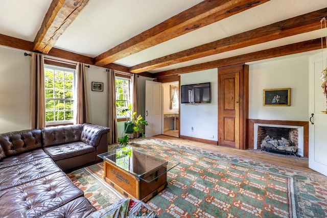 428 N Rd, Salisbury, NH 03235 - living area with beam ceiling and a fireplace