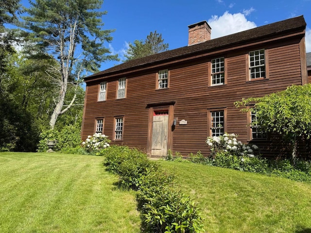 428 N Rd, Salisbury, NH 03235 - rear view of house with a chimney and a yard