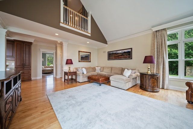 3 Baldwin Ln, Bedford, NH 03110 - living room featuring decorative columns, light wood-type flooring, ornamental molding, high vaulted ceiling, and recessed lighting