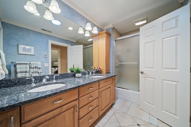 3 Baldwin Ln, Bedford, NH 03110 - full bathroom with crown molding, double vanity, tile patterned flooring, shower / bath combination with glass door, and a chandelier