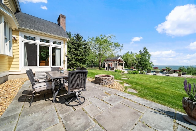 3 Baldwin Ln, Bedford, NH 03110 - view of patio / terrace featuring an outdoor fire pit and outdoor dining space
