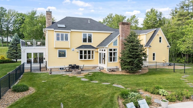 3 Baldwin Ln, Bedford, NH 03110 - rear view of property with a chimney, a patio, a fenced backyard, and a balcony