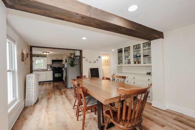 5 School St, Tilton, NH 03276 - dining room featuring light wood-type flooring, recessed lighting, and beamed ceiling