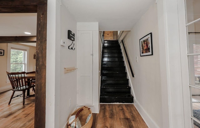 5 School St, Tilton, NH 03276 - staircase with wood finished floors and baseboards