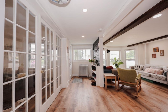 5 School St, Tilton, NH 03276 - foyer with radiator, wood finished floors, and recessed lighting