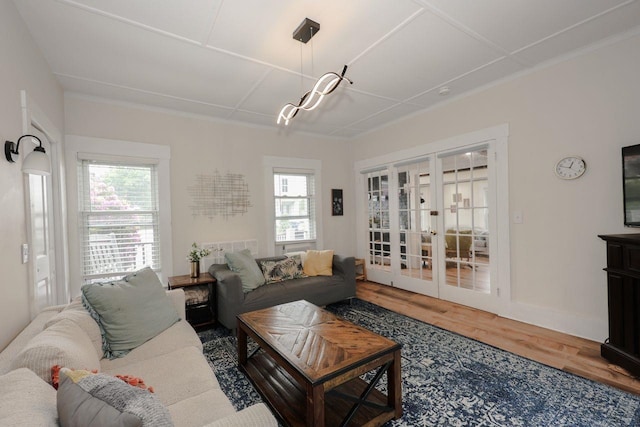 5 School St, Tilton, NH 03276 - living area featuring wood finished floors and french doors