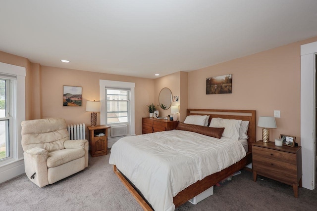 5 School St, Tilton, NH 03276 - bedroom featuring multiple windows, radiator heating unit, light colored carpet, and recessed lighting