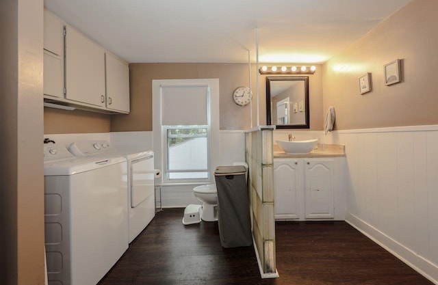 5 School St, Tilton, NH 03276 - bathroom featuring washer and dryer, wood finished floors, wainscoting, and vanity